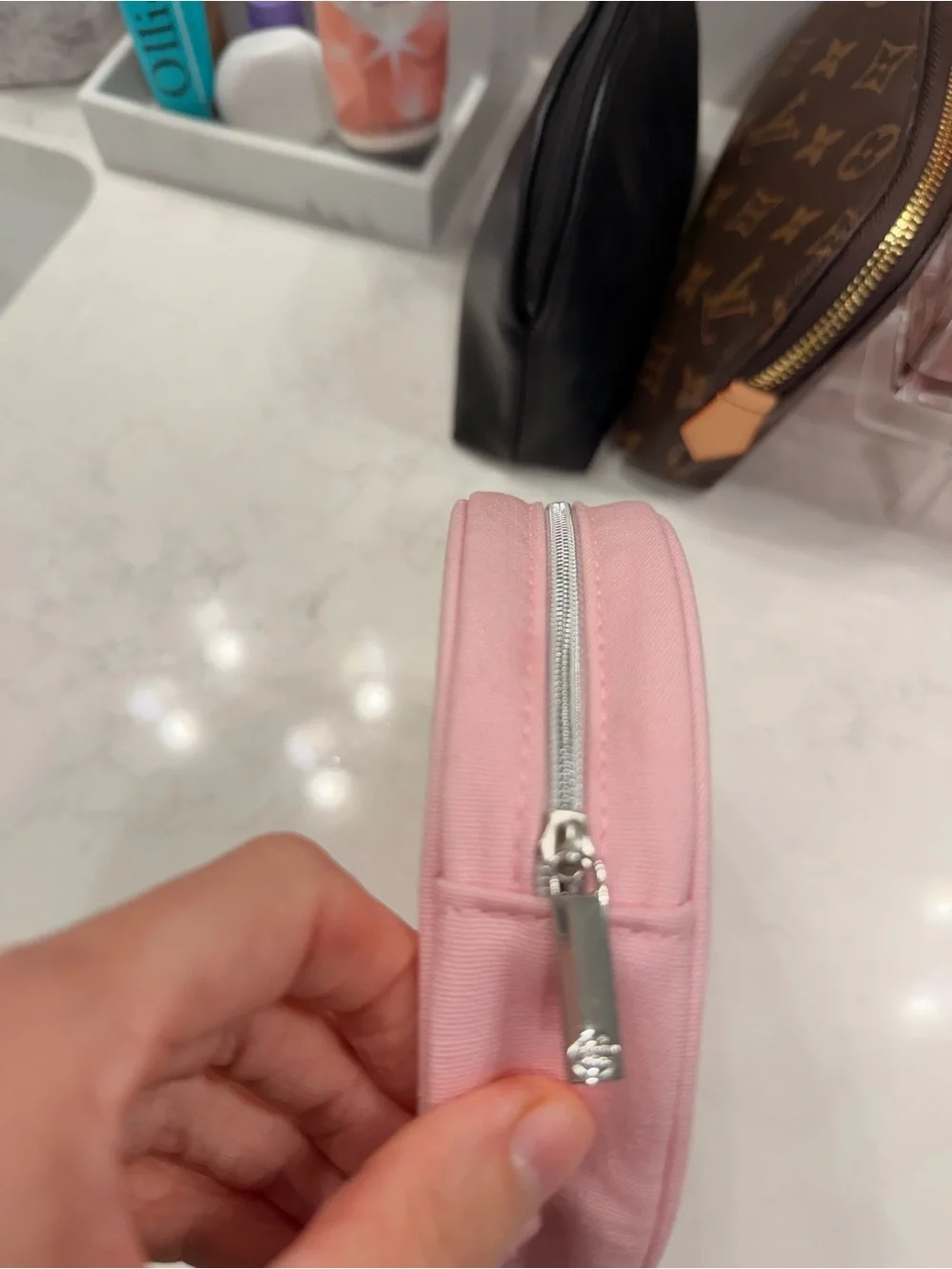 CHANEL Pink Round Cosmetic Case with Silver CC Emblem